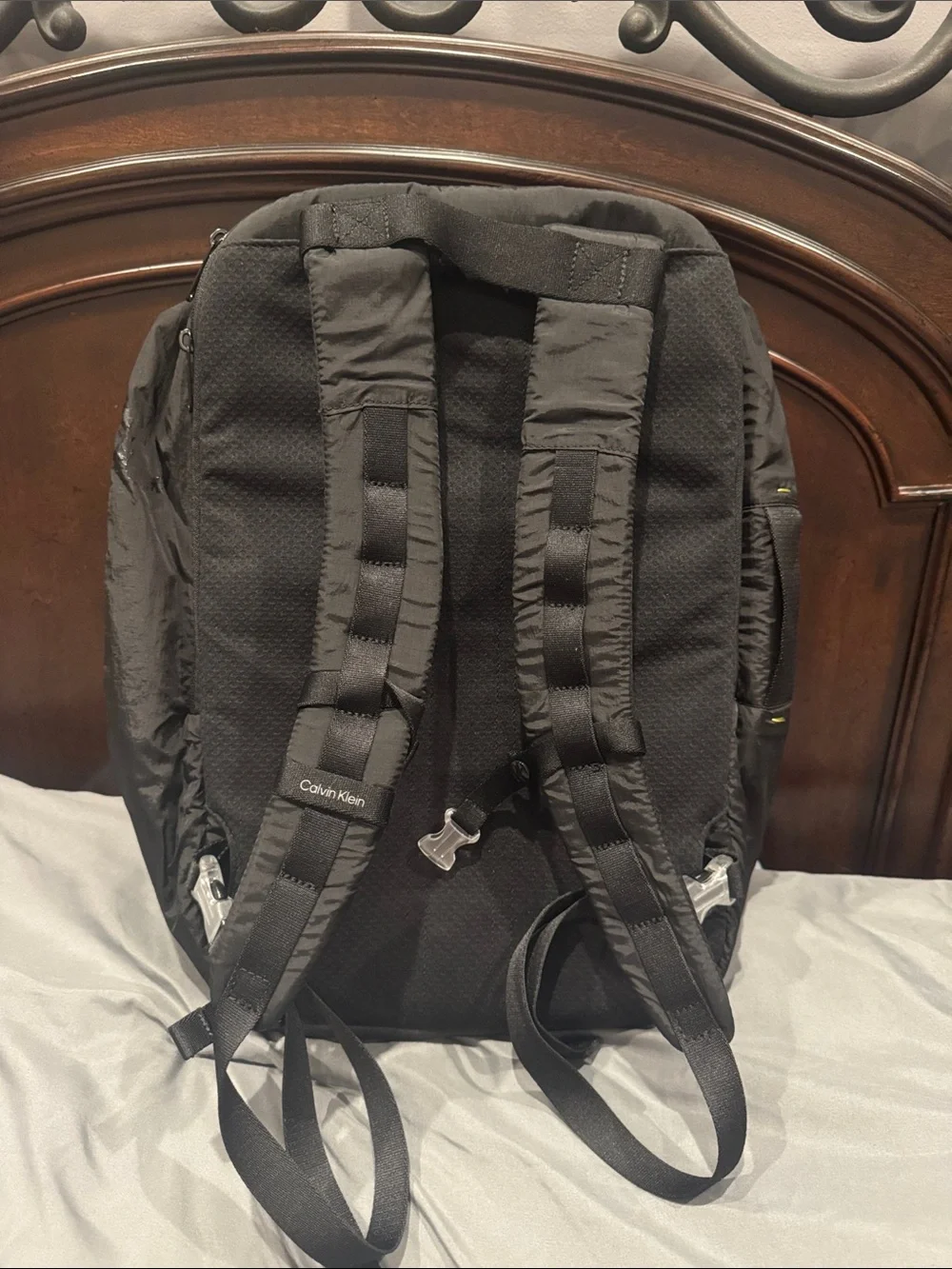 Calvin Klein Men's Black Backpack with Subtle Yellow Accents